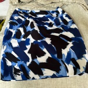never worn. Lined, polyester and Elastane, Blue, black, white geometric pattern